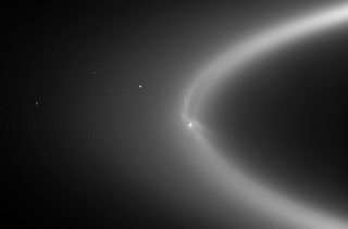 Enceladus, a moon of Saturn, is a 'cosmic graffiti artist,' astronomers discover