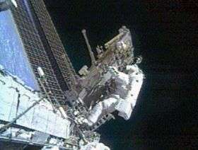 Astronauts Move Carts, Upgrade Communications System; Spacewalk Continues