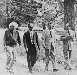 Albert Einstein having lunch with Niels Bohr and others - The
