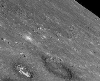 Dark Halos Discovered on Mercury