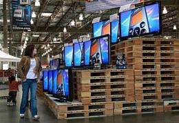 A customer looks at a display of televisions in San Francisco
