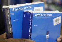 Adobe Systems posts 4Q loss, weighed by charges (AP)