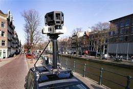 A Google Street View camera on top of a car at the Prinsengracht in Amsterdam, The Netherlands