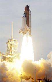 Space shuttle blasts off after month's delay (AP)
