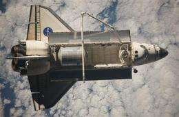 Space shuttle may need to dodge debris on way home (AP)