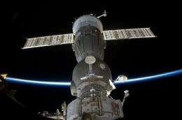 Astronauts inspect space shuttle ahead of landing (AP)