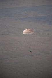Russian spacecraft with circus tycoon lands safely (AP)