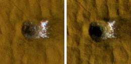 Scientists see water ice in fresh meteorite craters on Mars