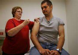 8 cities in US line up for swine flu vaccine test (AP)
