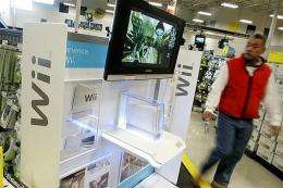A Best Buy customer walks by a display for the new Nintendo Wii in 2006 in San Francsico, California