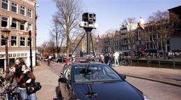 A Google Street View car with its camera in Amsterdam