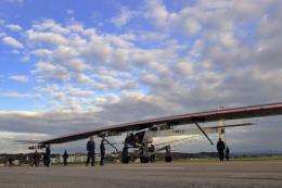 An aircraft dubbed 'Solar Impulse', HB-SIA prototype, is rolled out of a hangar
