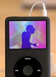 An Apple iPod plays an iPod commercial at an Apple Store in San Francisco