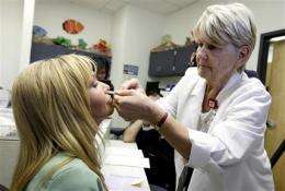 AP IMPACT: Gripes about swine flu vaccine abound (AP)