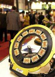 A probe pin ring, chip testing equipment, is on display at the three-day annual exhibition on seminconductor equipment