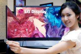A promoter shows LCD television panels which use an edge-lit light emitting diode (LED) backlight system