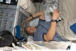 Astro_Mike: In space, everyone can hear you tweet (AP)