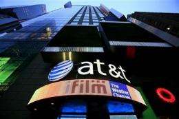AT&amp;amp;T earnings fall, but iPhone cushions the blow (AP)