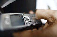 European travellers will pay less to send text messages and access the internet via mobile phone