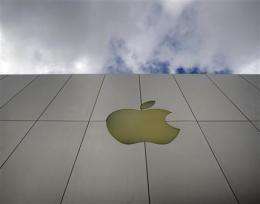 Investors lap up Apple's 47 percent profit jump (AP)