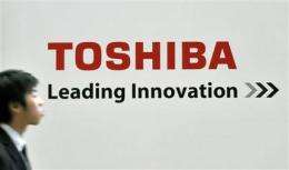 Japan's top chipmaker Toshiba posts record loss (AP)