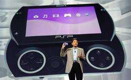 Kazuo Hirai, Chairman and Group CEO of Sony Computer Entertainment, Inc., displays the new Sony PSP Go