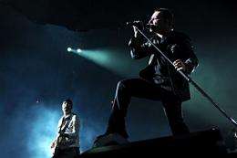 Lead signer Bono (R) and Guitarist The Edge (L) of U2