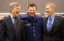 L-R: Astronauts Robert Thirsk, Roman Romanenko and Frank De Winne
