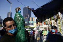 Mexicans put faith in masks _ but do they work? (AP)