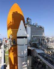 NASA: Fuel test a success, shuttle launch day set (AP)