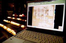 Pages of the Codex Sinaiticus are pictured on a laptop in Westminster Cathedral, central London