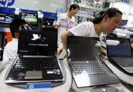 PC makers race to comply with China's Web filter (AP)