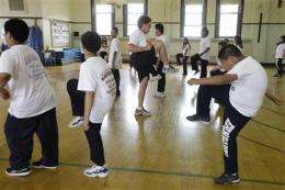 PE requirement isn't enough to fight obesity (AP)