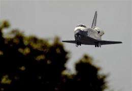 Shuttle lands in Florida, ending 13-day voyage (AP)