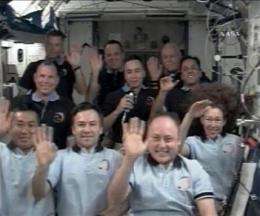 Shuttle, space station crews part after 8 days (AP)