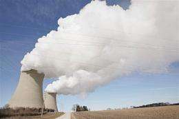 Steam billows from the cooling towers at a nuclear power generating station in Byron