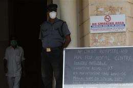 Swine flu closes more NYC schools, spreads in Asia (AP)