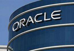 The Oracle logo is displayed on the company's world headquarters in Redwood Shores