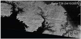 Global view of valleys on Titan shows north south contrast