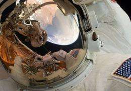 US astronaut John Grunsfeld performing a spacewalk