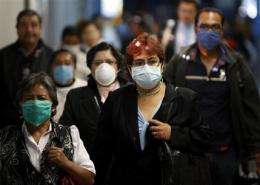 WHO raises its pandemic alert level on swine flu (AP)