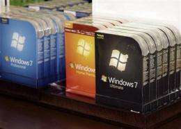 Windows plan lowers Microsoft profit but shares up (AP)