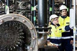 Workers at the Statkraft Osmotic power plant prototype in Tofte