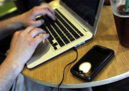 Young workers push employers for wider Web access (AP)
