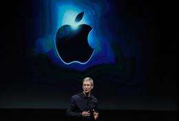 Apple CEO Tim Cook during an event introducing the new iPhone 4s