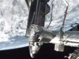Astronauts get busy with space station stockpiling (AP)