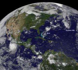 GOES satellite sees a triple header in the tropics