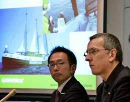 Greenpeace safety advisor Jan van de Putte of Belgium and Greenpeace Japan executive director Junichi Sato