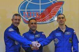 (L-R) US astronaut Dan Burbank and Russian cosmonauts Anton Shkaplerov and Anatoly Ivanishin