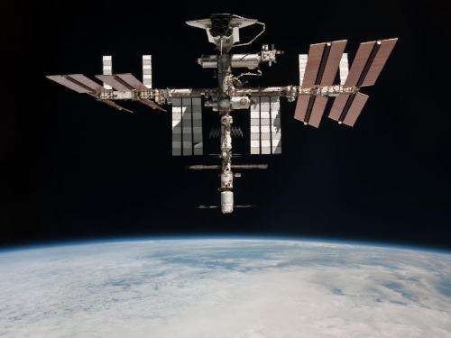NASA releases first photo of shuttle docked in space